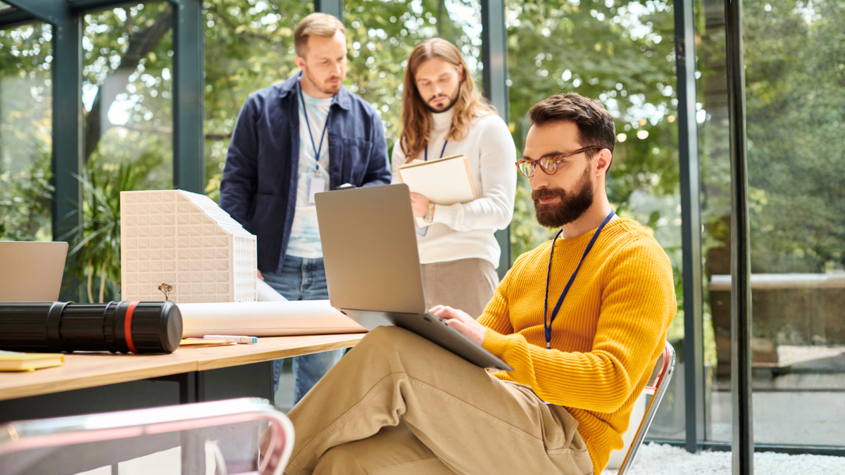 Architectural outsourcing team using models and software to help design firms scale faster efficiently globally.