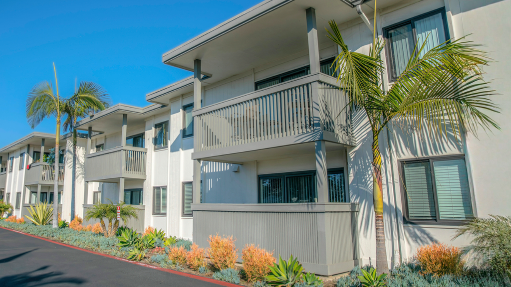 Apartment rental property exterior shows hidden costs landlords face when self-managing maintenance, vacancies, and tenants.