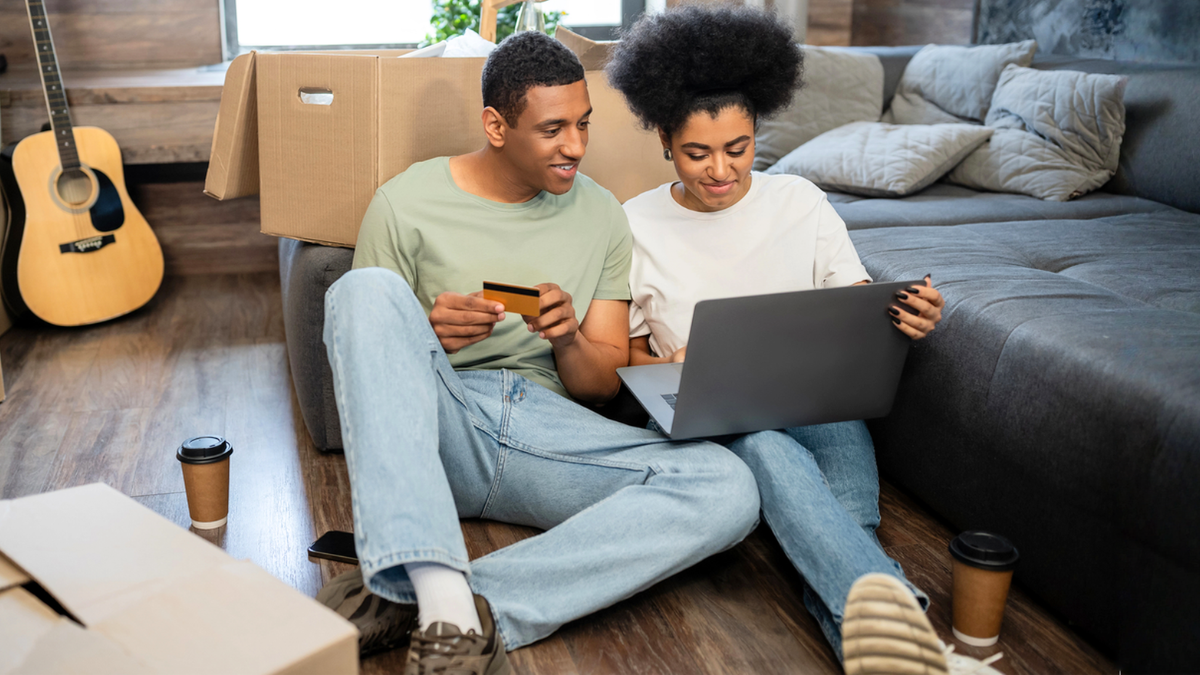 Prospective tenants with bad credit applying online for rental housing while landlords review screening options.