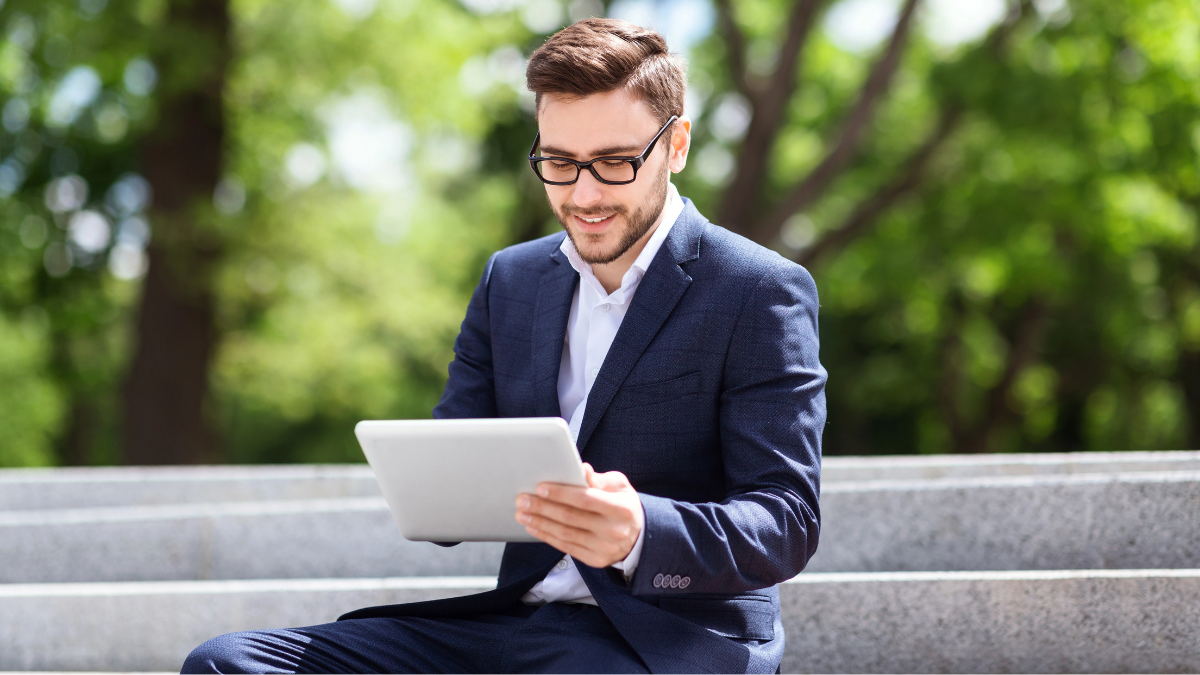 Property manager using tools on his tablet