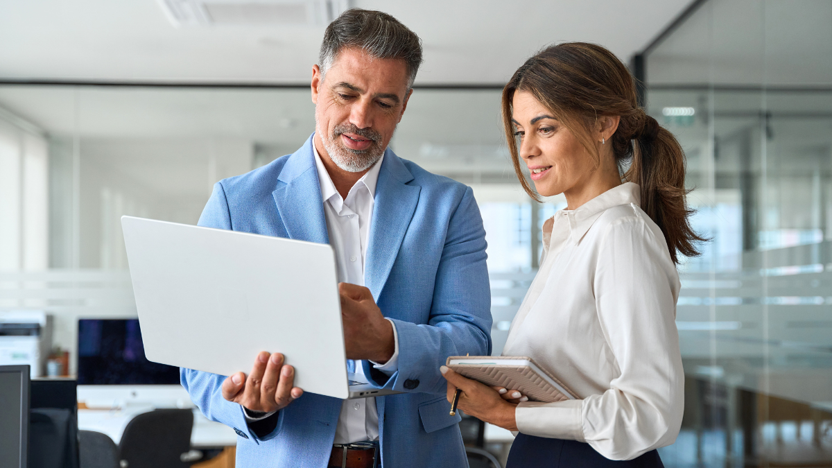 Investors reviewing data online to find off-market real estate deals through proven sourcing strategies faster.