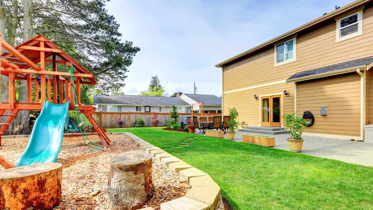Family rental backyard with playground and patio shows simple upgrades for stress-free tenant living spaces.