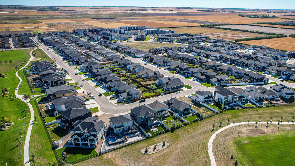 Aerial view of newly built suburban homes highlighting growth opportunities for buyers in expanding communities.
