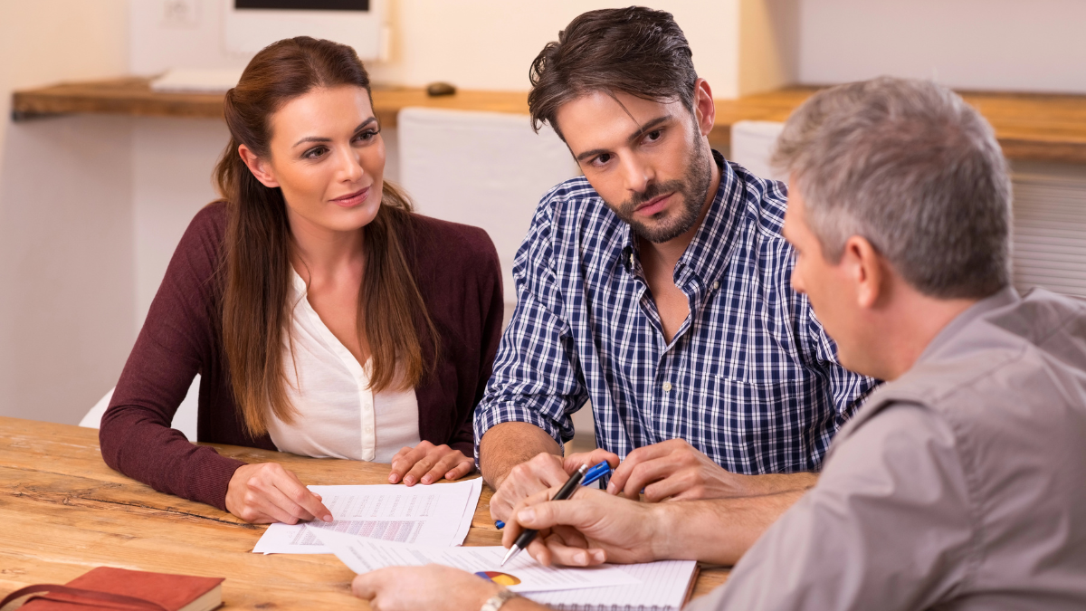 Couple discussing life insurance as loan collateral