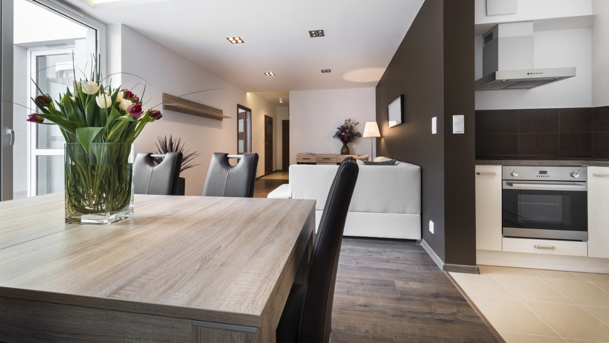 Furnished rental apartment interior highlighting short-stay investment risks, owner checklist, and guest-ready property amenities features.