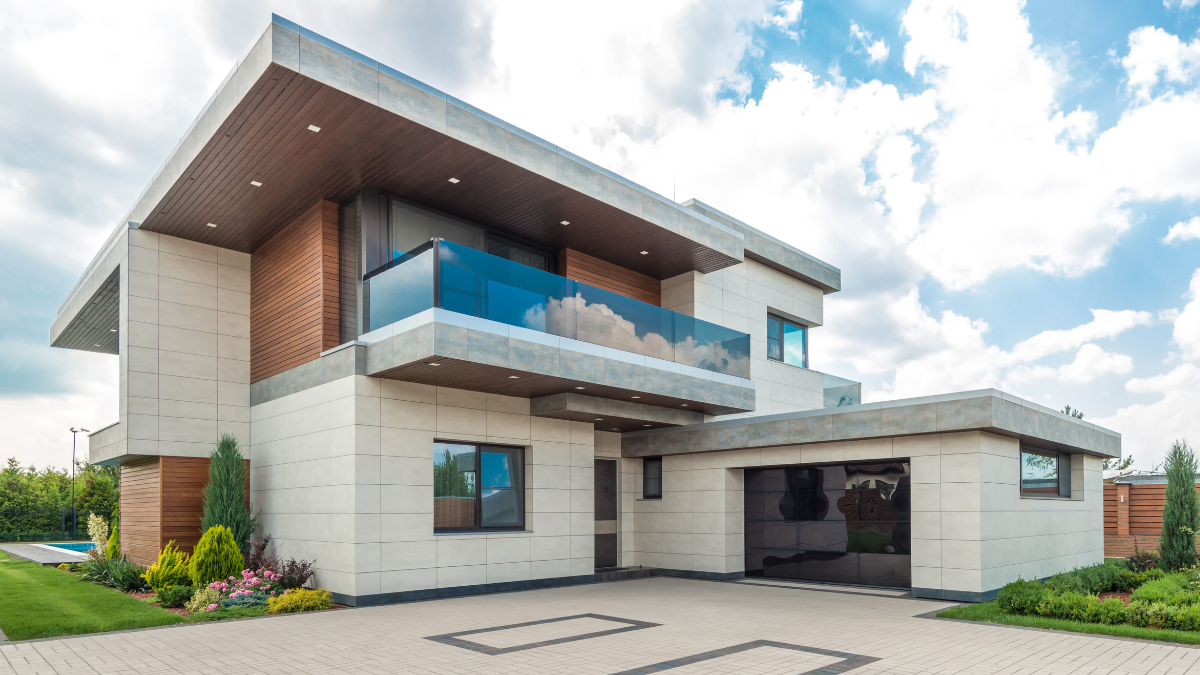 Modern home with upgraded garage showcases improved curb appeal and increased resale value potential.
