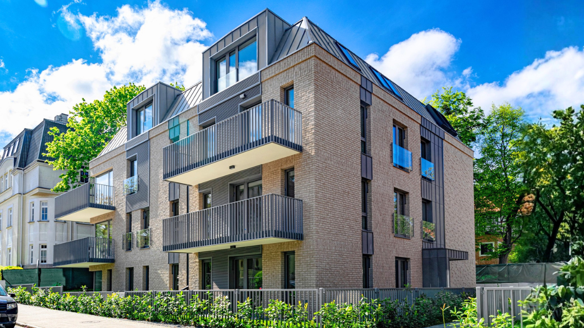 Exterior street view of a multi-story rental building.