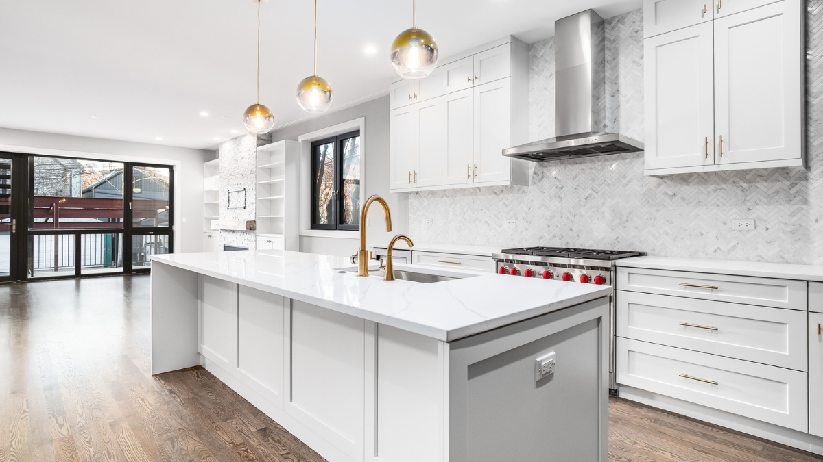Kitchen with custom metal finishes for rental property.