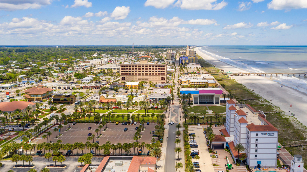 Aerial Jacksonville coastline and downtown area highlights Florida value city relocation opportunities in 2026 living.