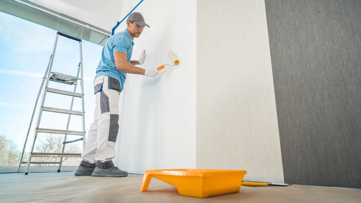 Painter making pre-sale home improvements.