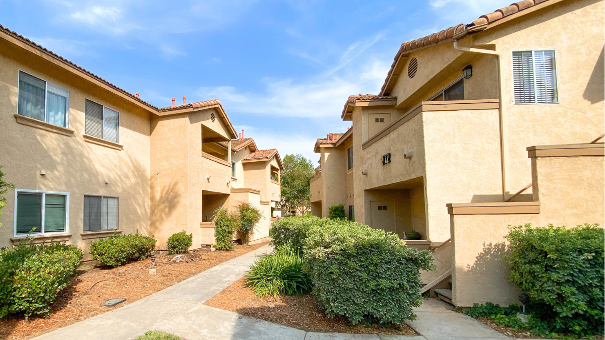 Apartment community exterior showing preventive maintenance protecting rental property value, curb appeal, and long-term returns.
