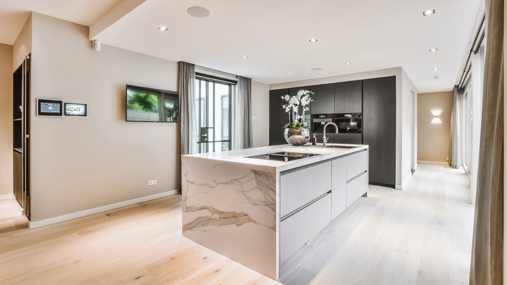 Modern rental property kitchen with smart upgrades justifying higher monthly rent and increased tenant demand.