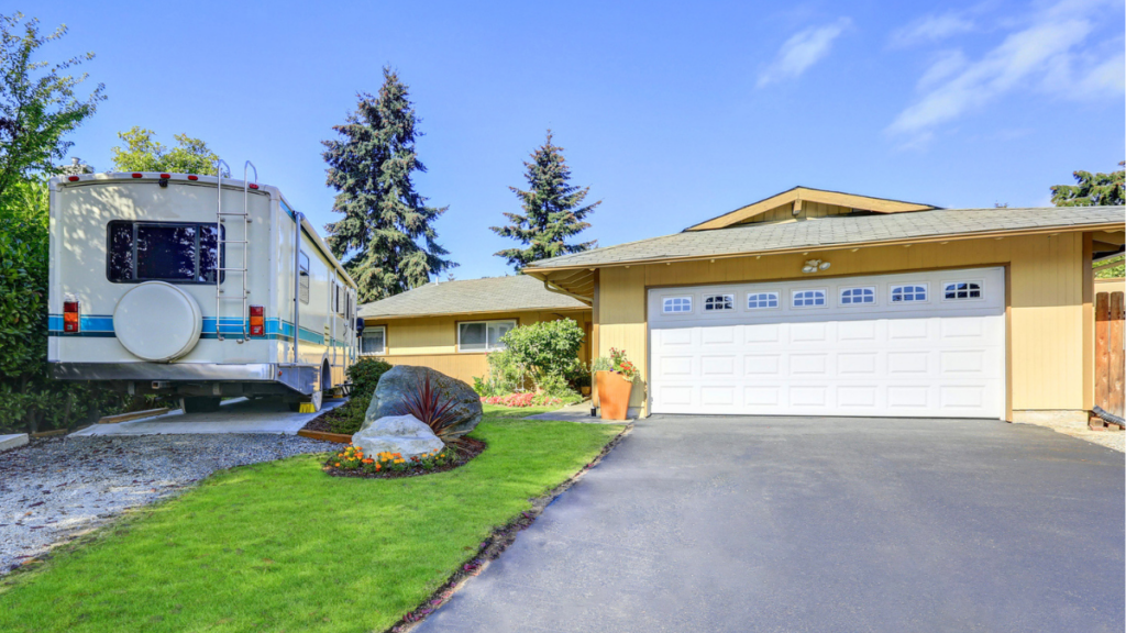 RV-friendly rental property with driveway hookup space, garage and adding homeowner value.