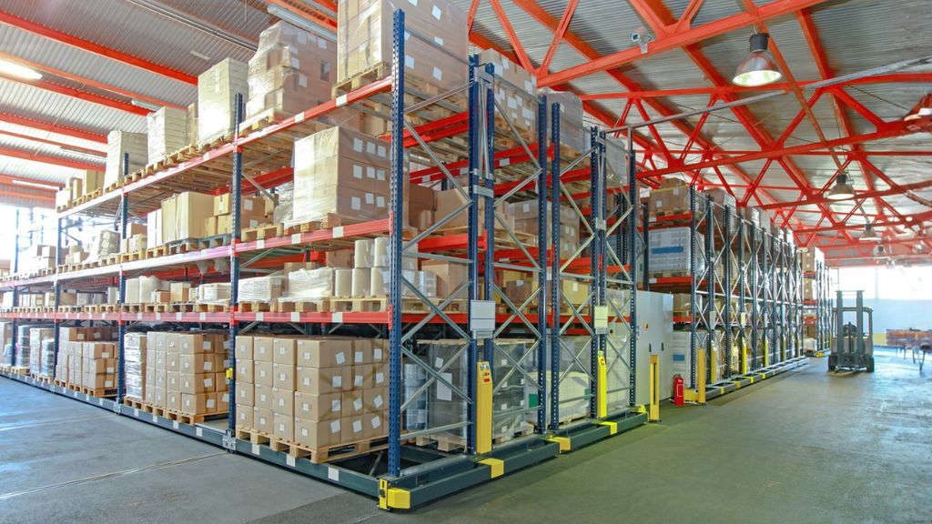 Warehouse racks retrofitted with vertical automation improve old asset storage efficiency and industrial property management.