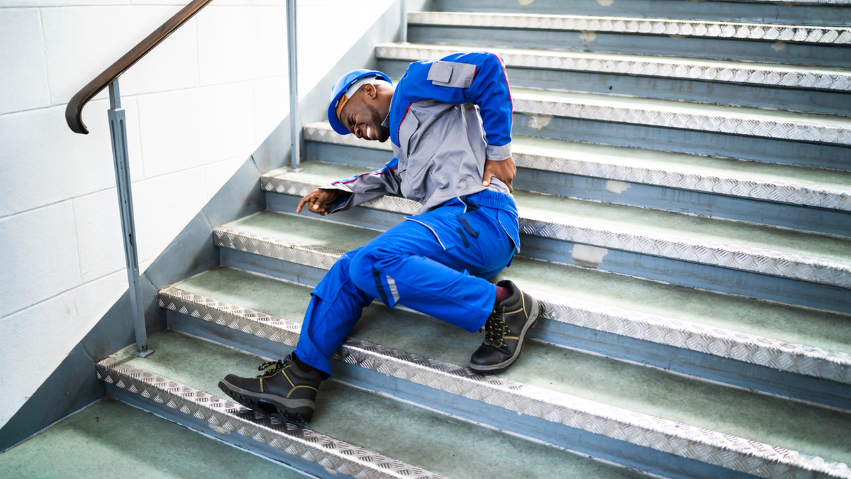 Worker injured after slipping on stairs highlights settlement factors in slip and fall injury claims.