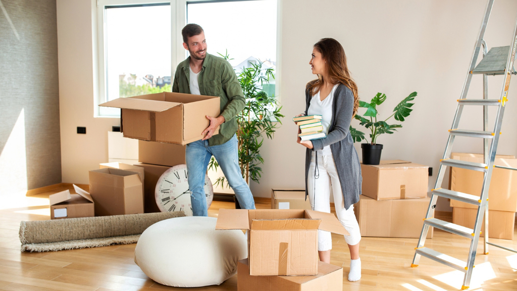 Miami renters unpacking moving boxes learn important moving day planning lessons for smoother apartment relocations.