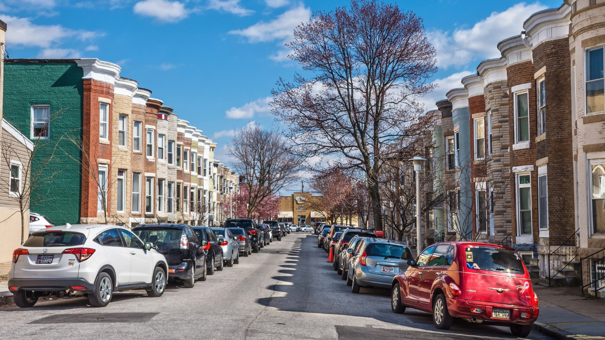 Street view of older row homes in Philadelphia